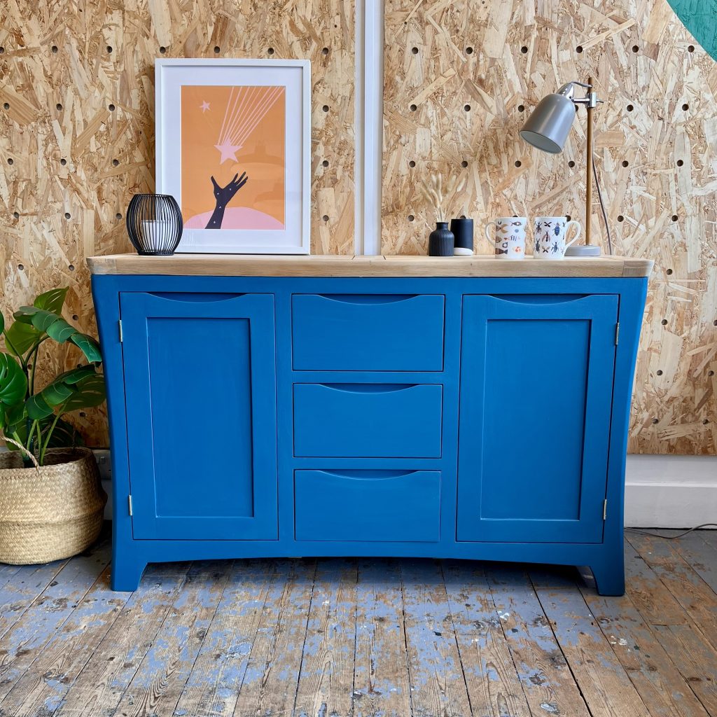 contemporary blue sideboard with a natural wood top