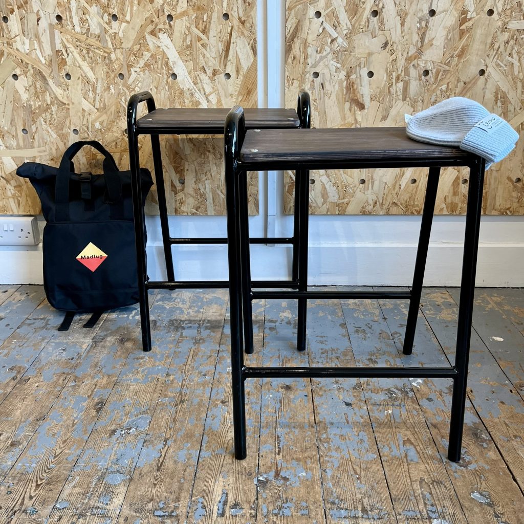 Pair of black metal stools