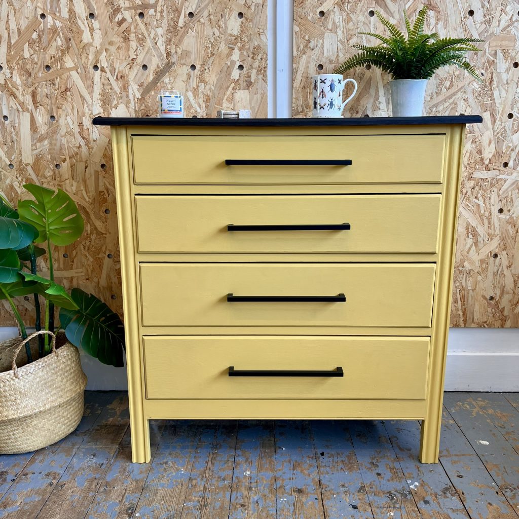 mustard yellow chest of four drawers